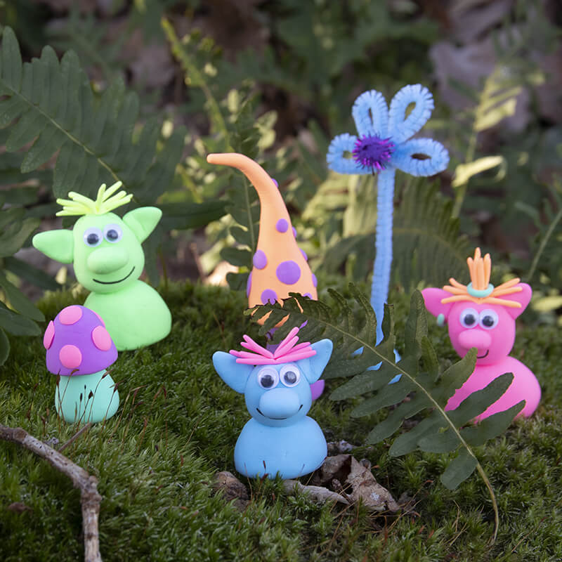 Make mushrooms and trolls out of clay